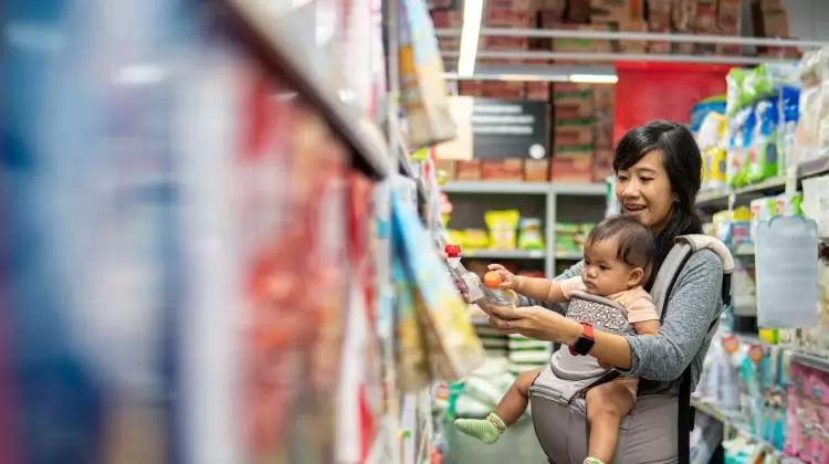 Woman shopping with baby
